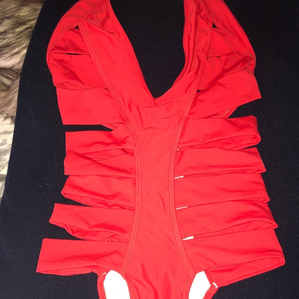 Red lush strappy one piece! Never used